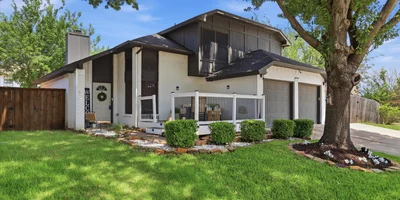 Front elevation of two story home for sale in South Arlington, Texas