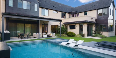 Luxury 6-bedroom, 6.5-bath custom home with pool, spa, in-law suite, and designer finishes in Frisco ISD