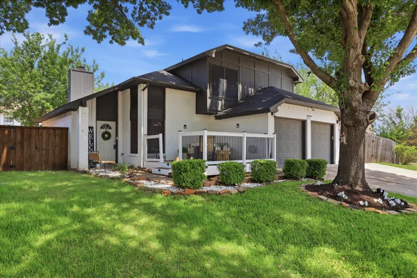 Front elevation of two story home for sale in South Arlington, Texas