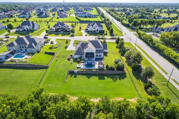 A luxury Toll Brothers home on 1.5 acres in the highly acclaimed Lovejoy ISD.