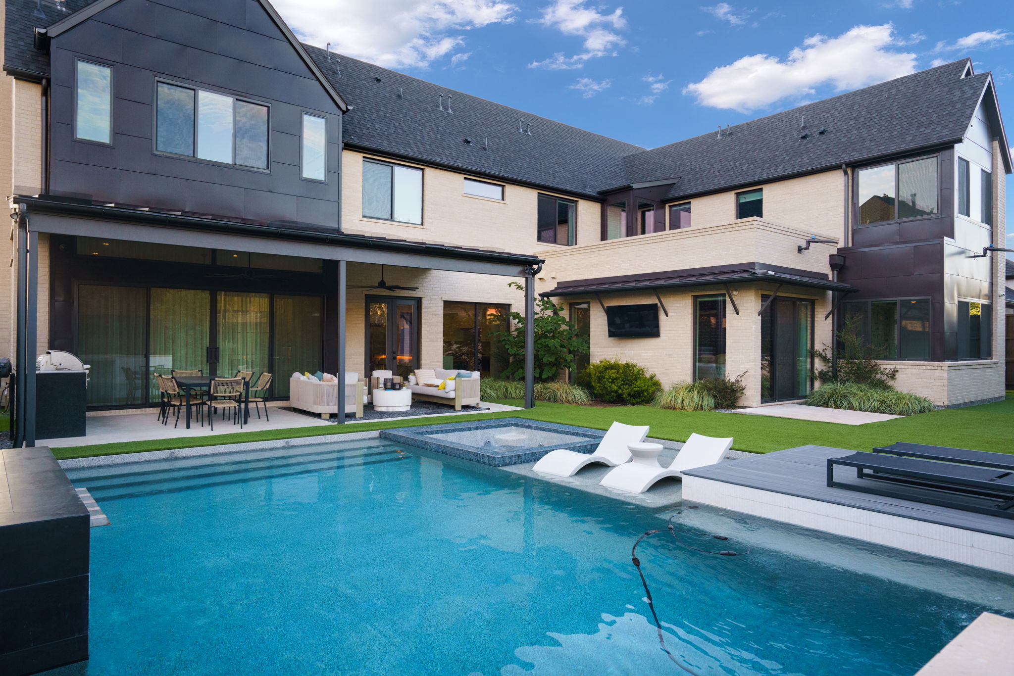 Luxury 6-bedroom, 6.5-bath custom home with pool, spa, in-law suite, and designer finishes in Frisco ISD