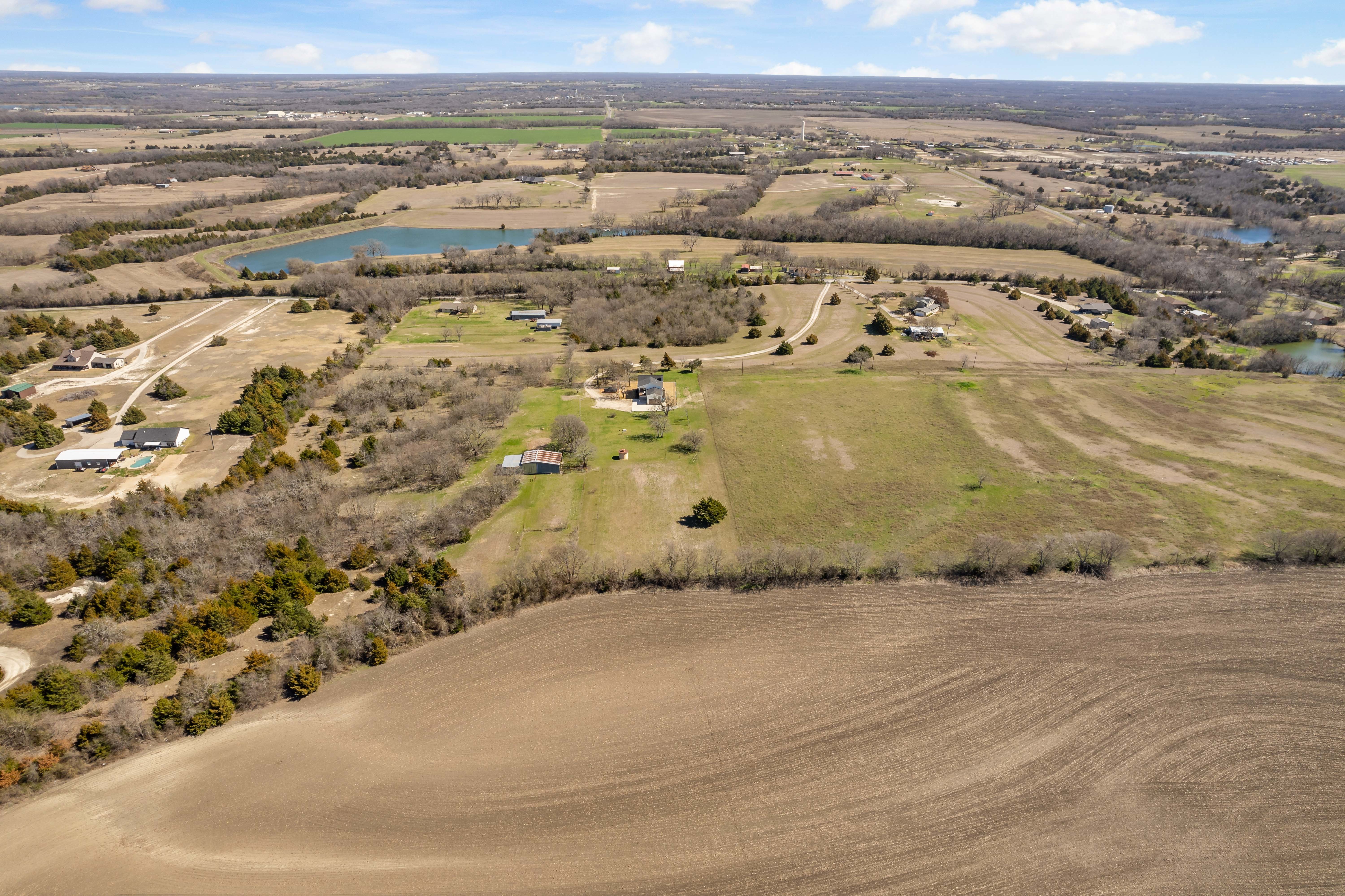 Drone photo of updated home and workshop on 17.56 acres for sale
